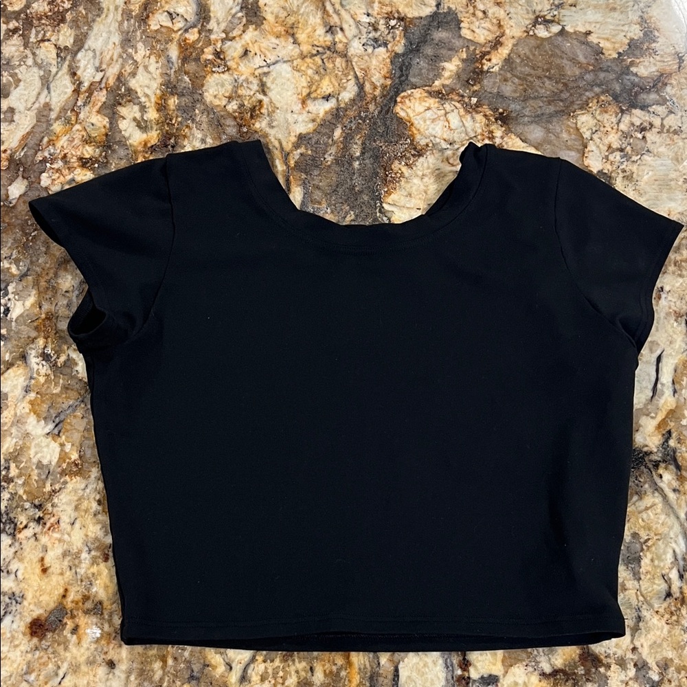 Bombshell crop top size medium (could fit a small well)